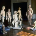 Half-life size plaster figures in living room before moving