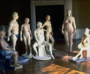 Half-life size plaster figures in living room before moving